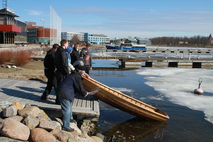 Testing wooden boat at vocational school